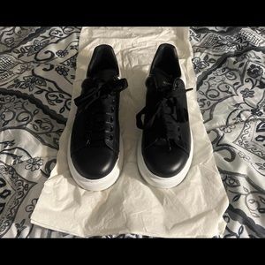 Alexander Mcqueens Leather woman sneakers size 8.5! Used but in good condition!